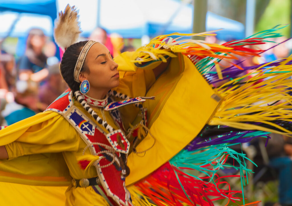 Portland, Oregon USA - June 14, 2014: A closeup of a dancing Native American Woman with her eyes closed at the annual Delta Park Pow Wow in Portland, Oregon.