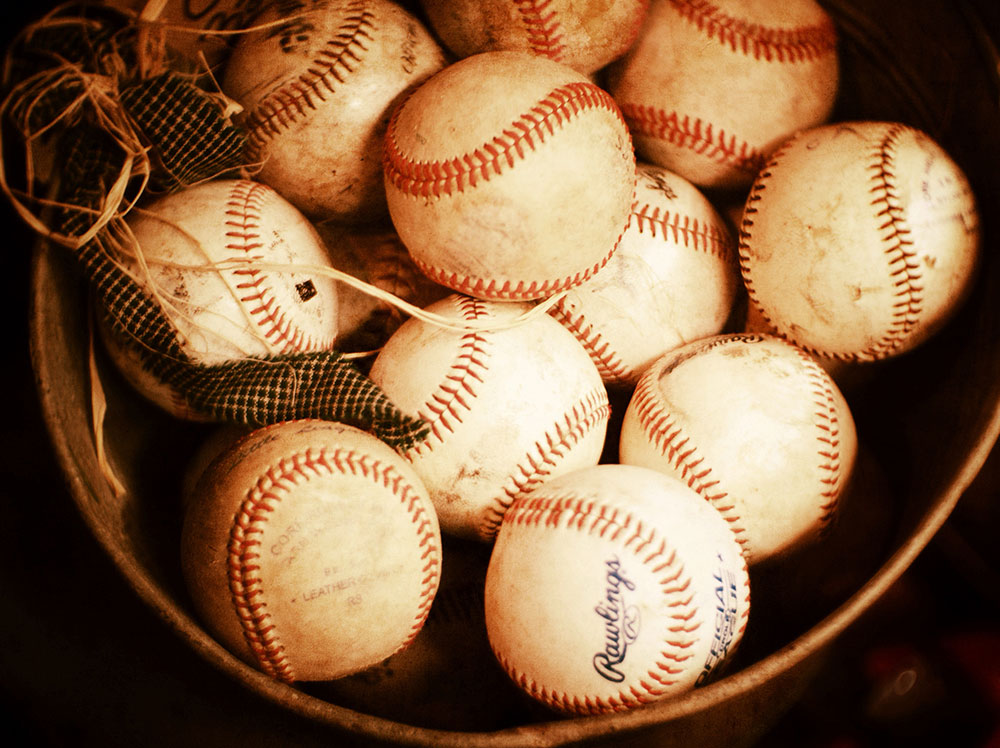 Bucket is old baseballs