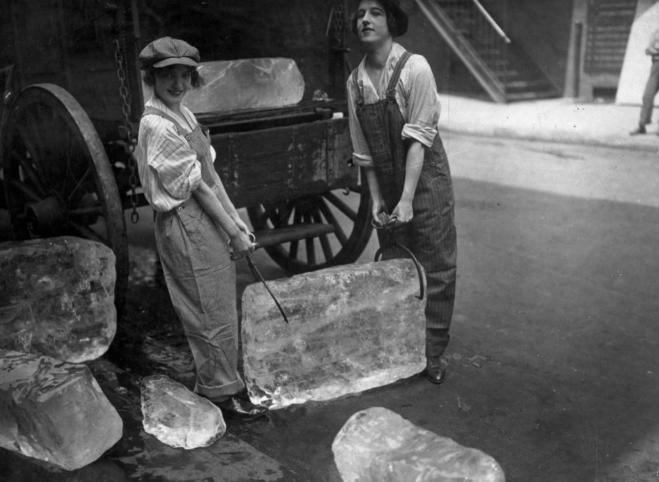 Two woman delivering ice